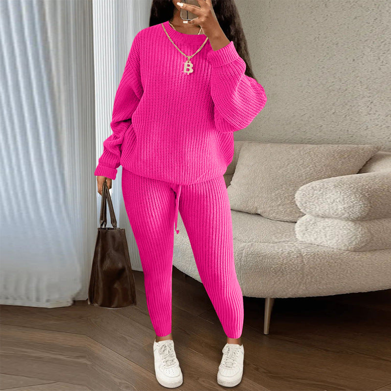 Woman in matching ribbed knit sweater and pants set