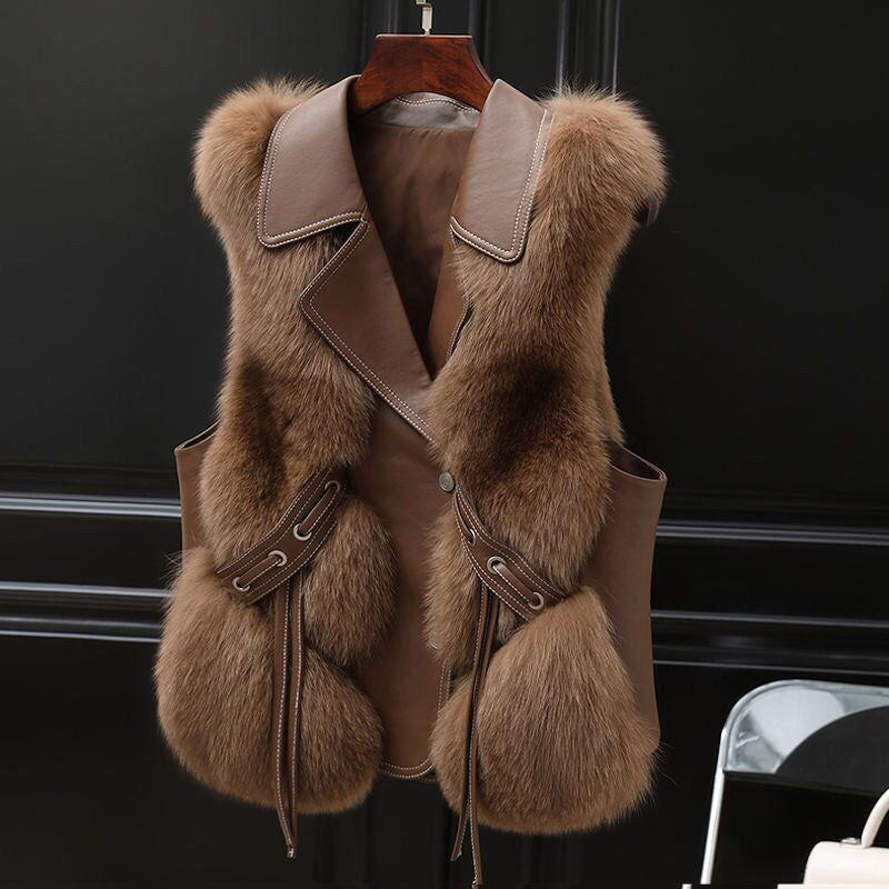 Woman in a short faux fur vest