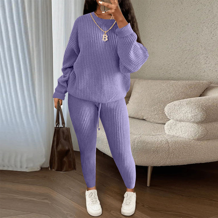 Woman in matching ribbed knit sweater and pants set