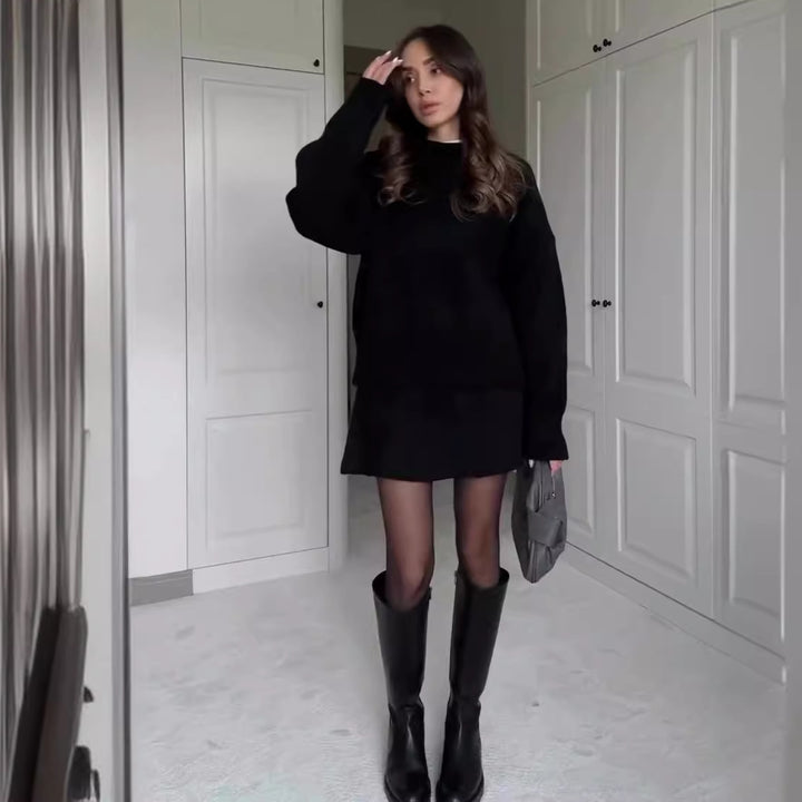 Woman in matching knit sweater and mini skirt set