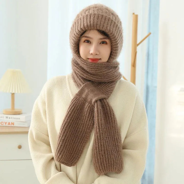 Woman wearing a knit hood with scarf