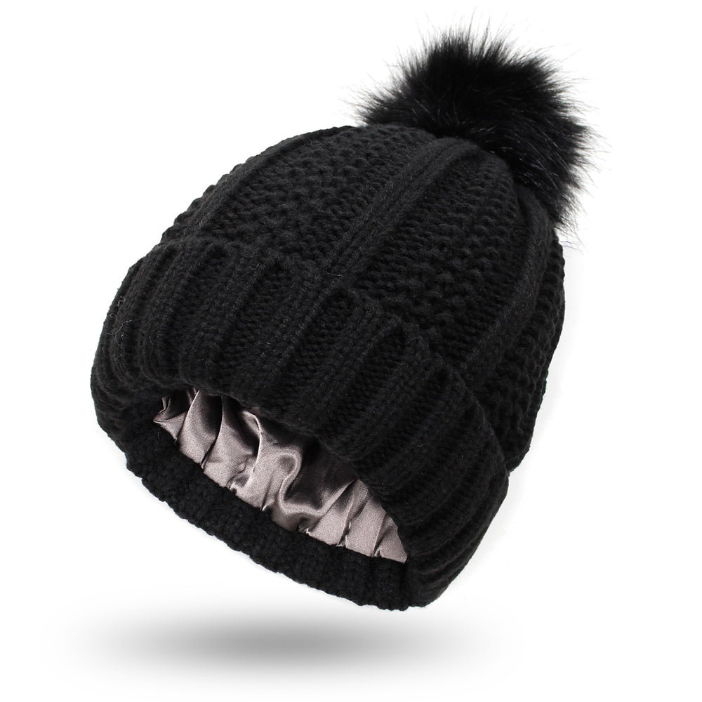 Knit beanie with faux fur pom pom