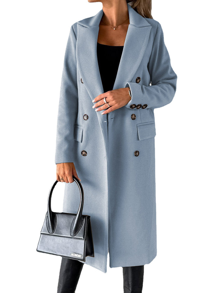 Woman in long double-breasted coat