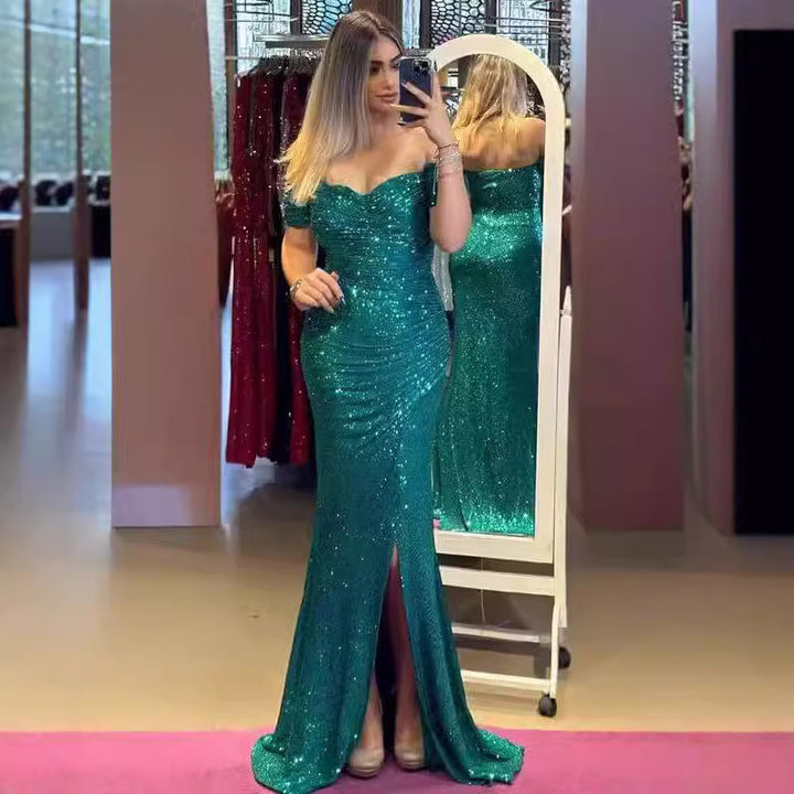 Woman in long off-shoulder sequin evening dress