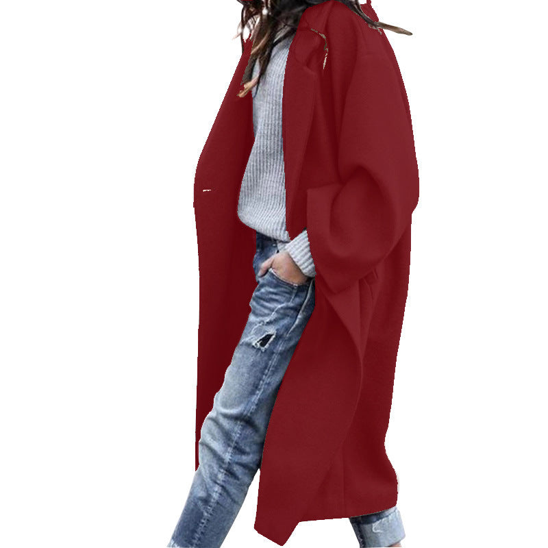 Woman in long oversized lapel coat
